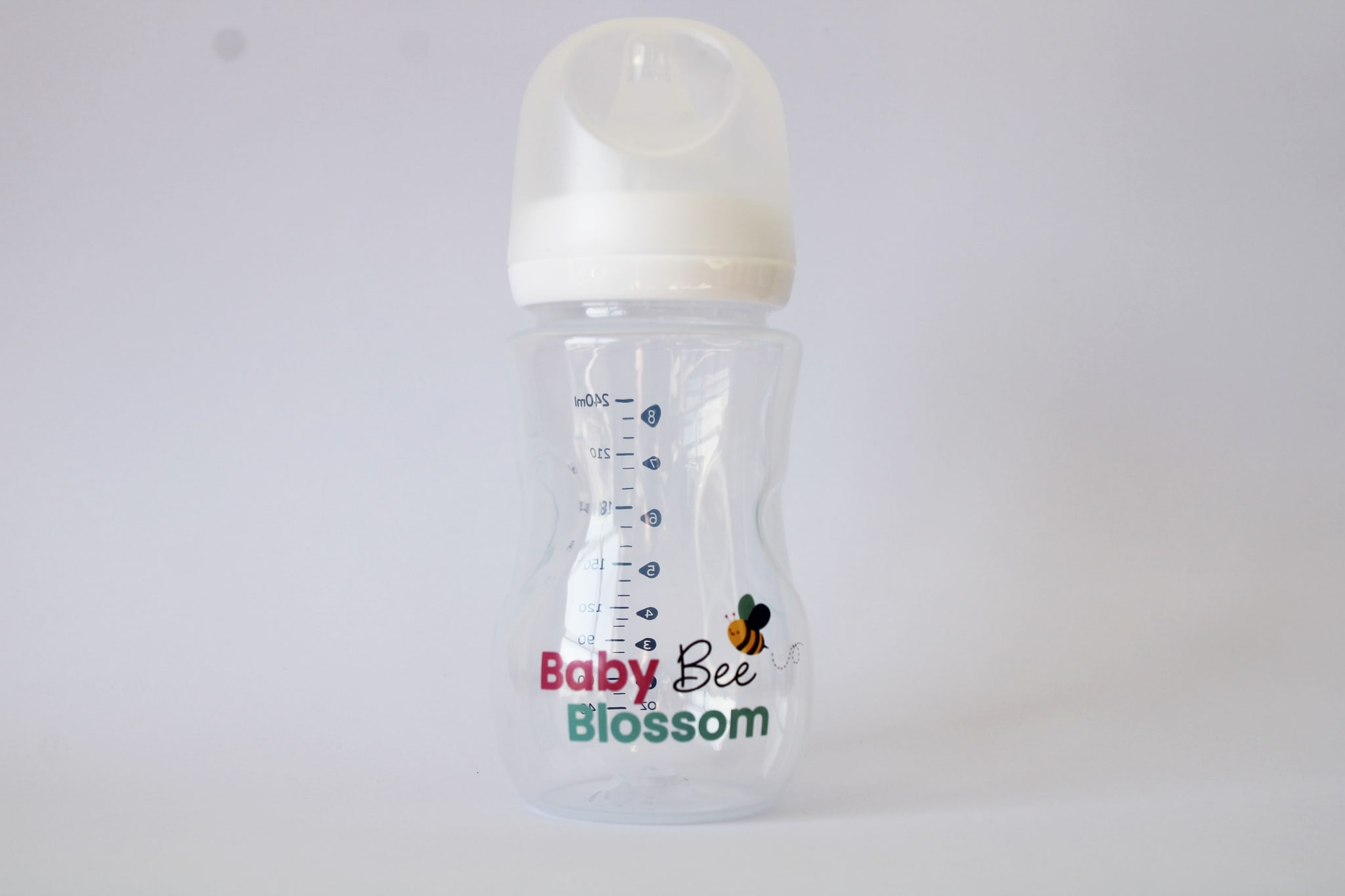 Baby Bee Blossom 240 ml feeding bottle with cap fitted